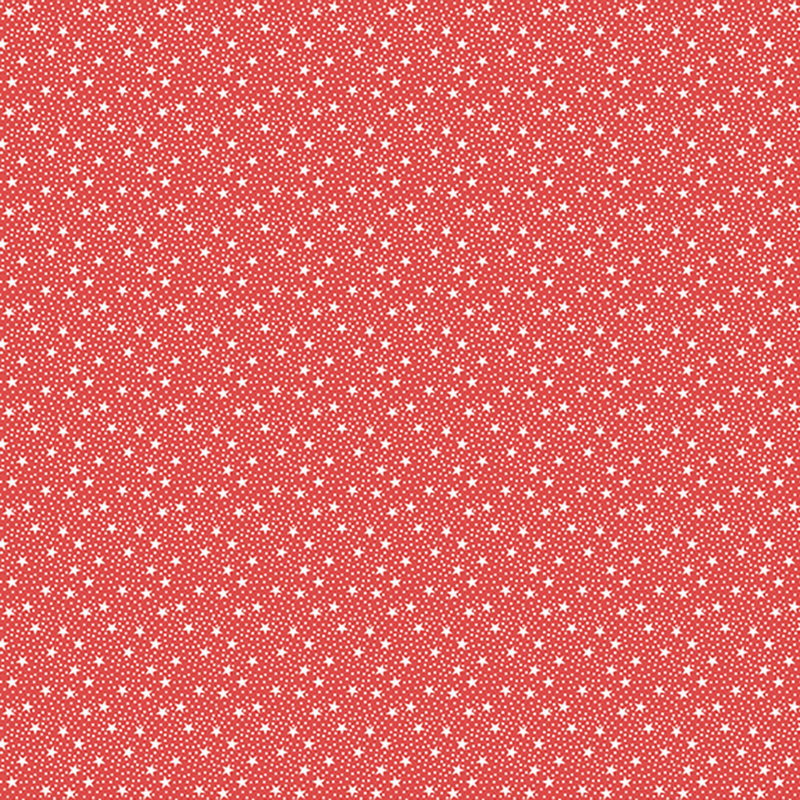 Red fabric with tiny white tossed stars and pinprick dots.