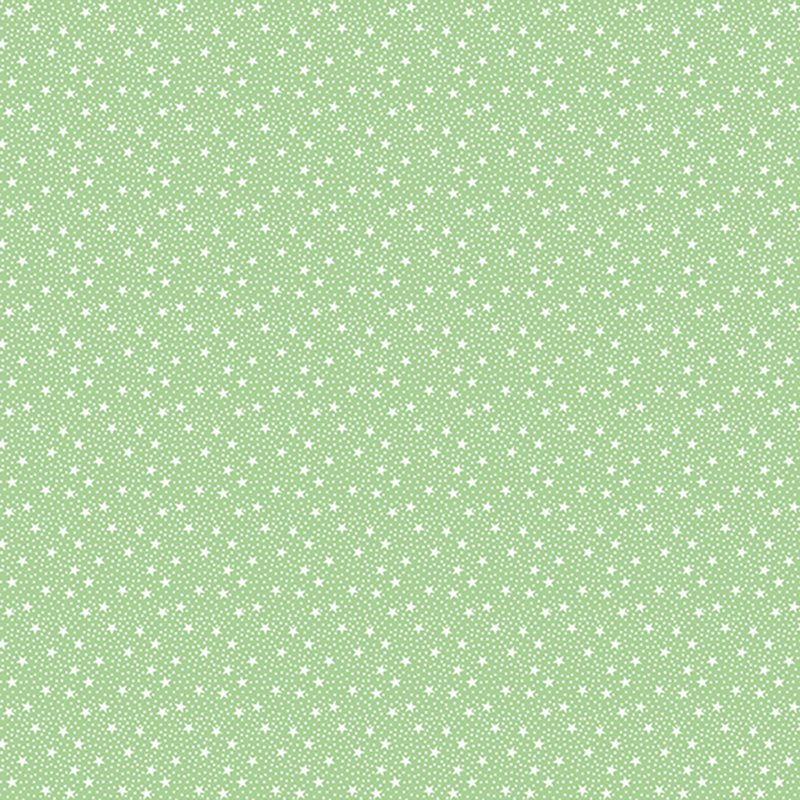 Grass green fabric with tiny white tossed stars and pinprick dots.