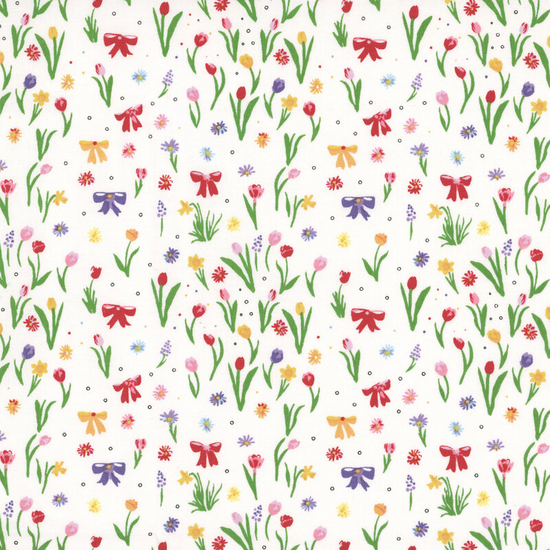 Stark white fabric with small red, yellow, and blue bows intermixed with tulips growing from the ground.