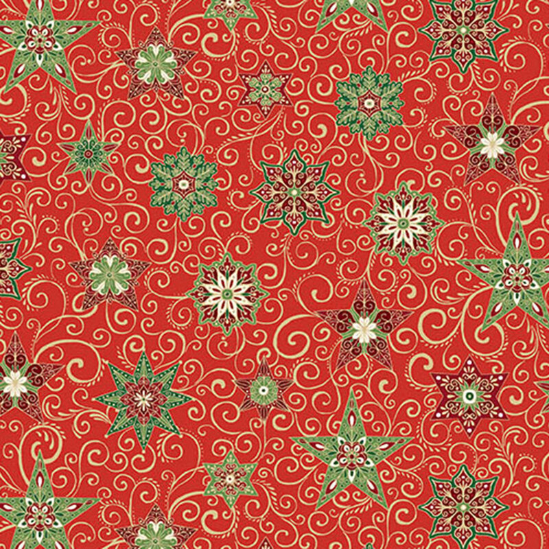 A red fabric with decorated stars, snowflakes, swirls, and gold metallic accents. 