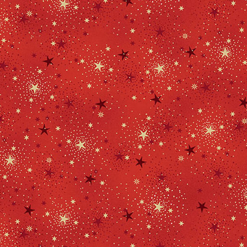 A speckled red fabric with stars and gold metallic accents. 