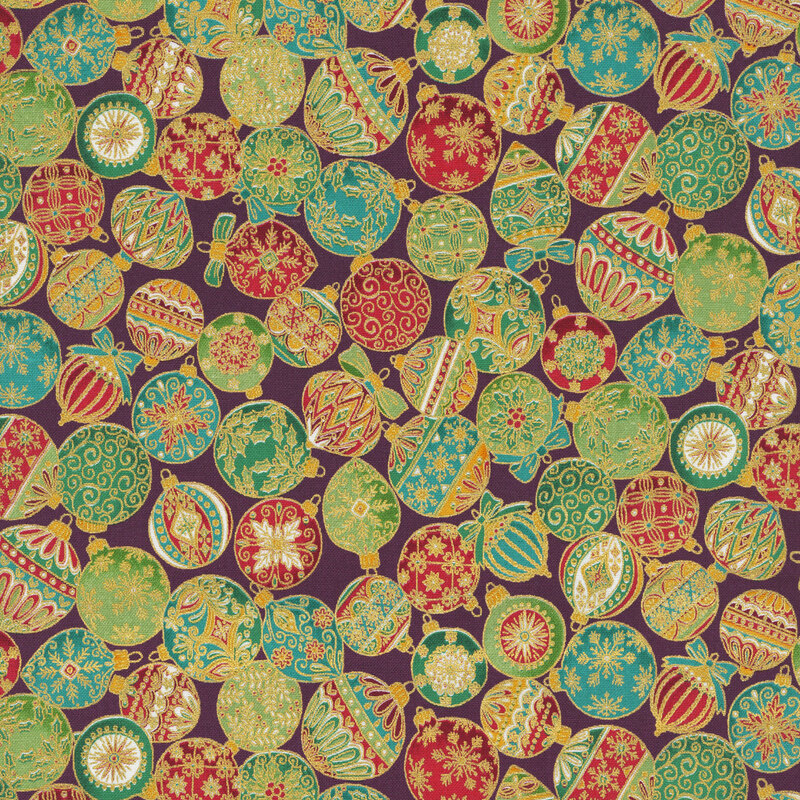 A maroon fabric with packed decorated christmas ornaments and gold metallic accents. 