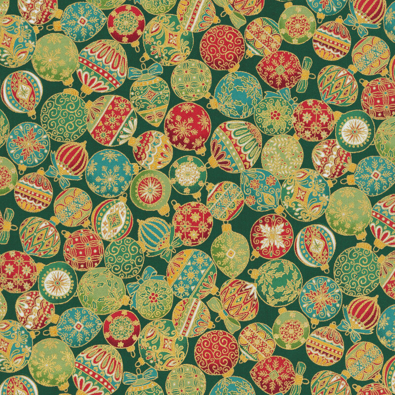 A dark green fabric with packed decorated christmas ornaments and gold metallic accents. 