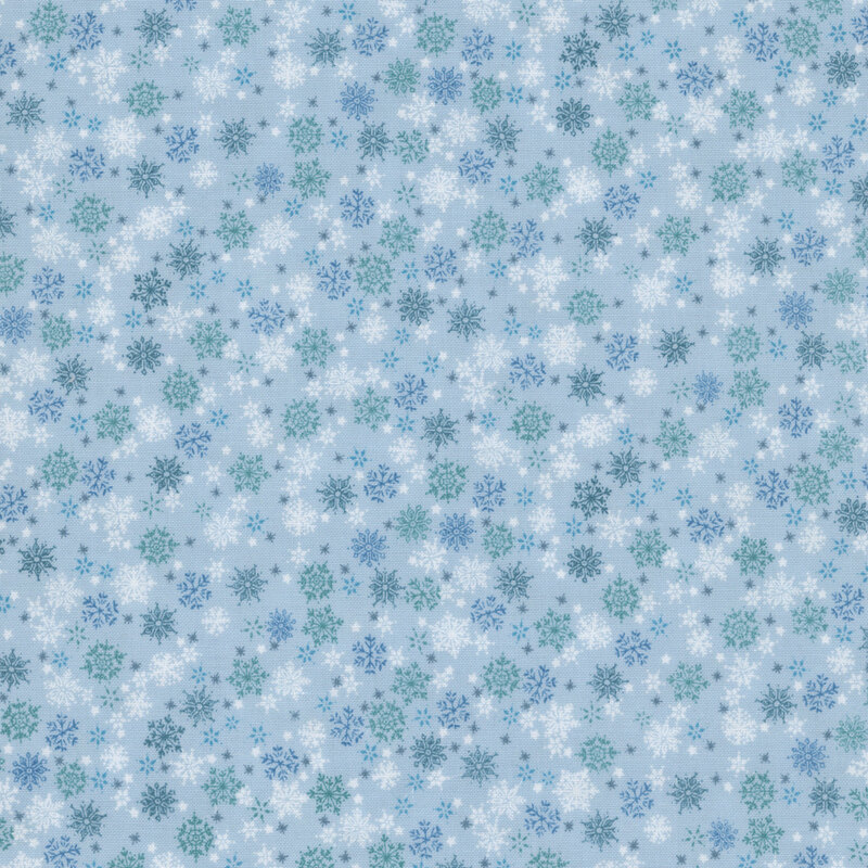 White stars and snowflakes in white, blue, and teal on a blue background.