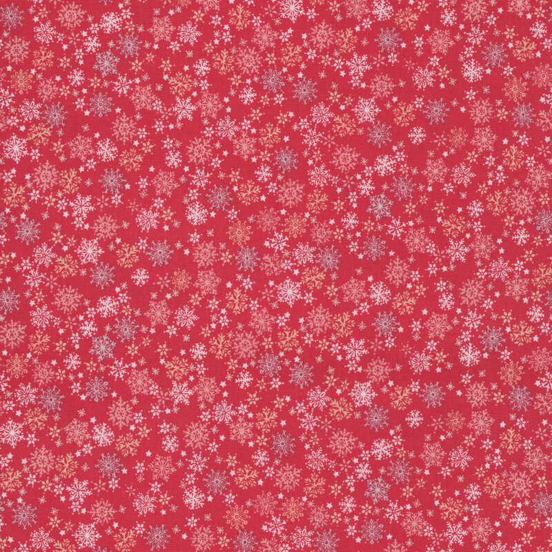 Stars and snowflakes in white and cream on a cardinal red background.