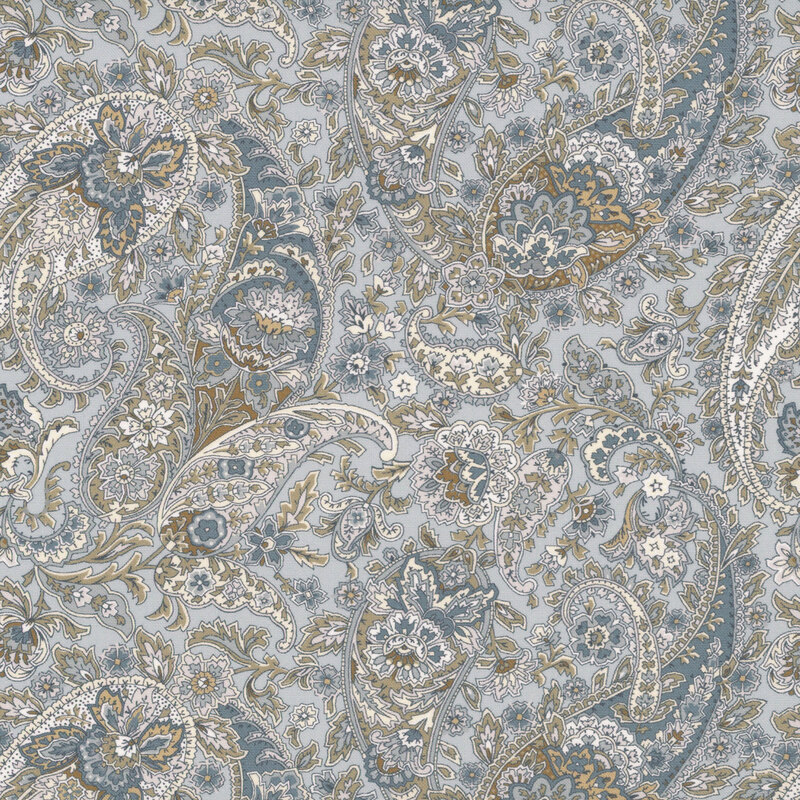 Blue gray fabric featuring a floral paisley design in blues and browns.