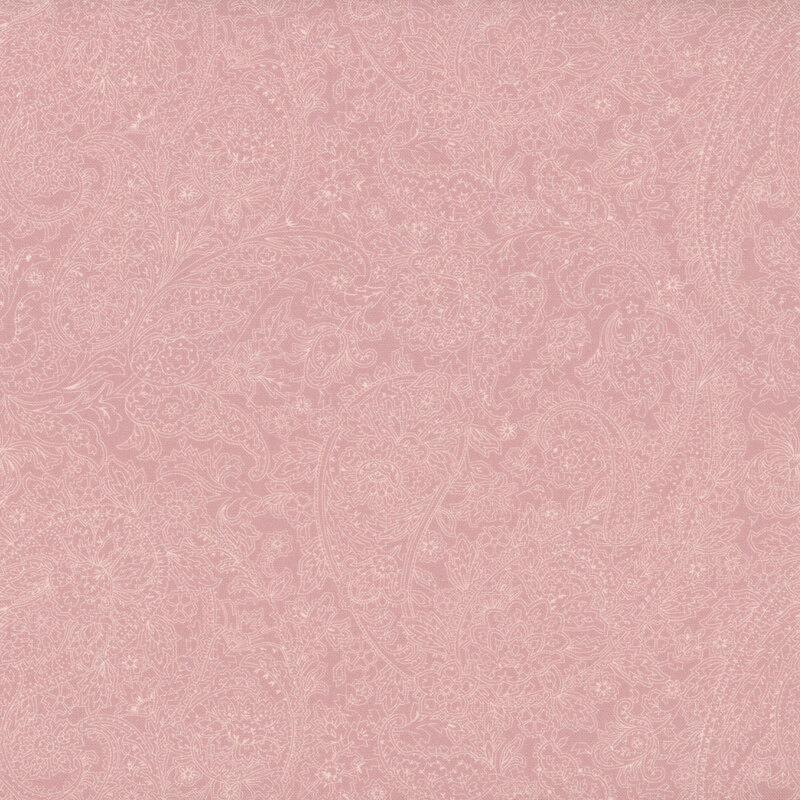 Tonal blush pink fabric featuring a floral paisley design.