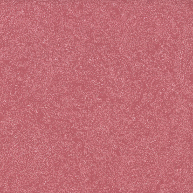 Tonal rose pink fabric featuring a floral paisley design.