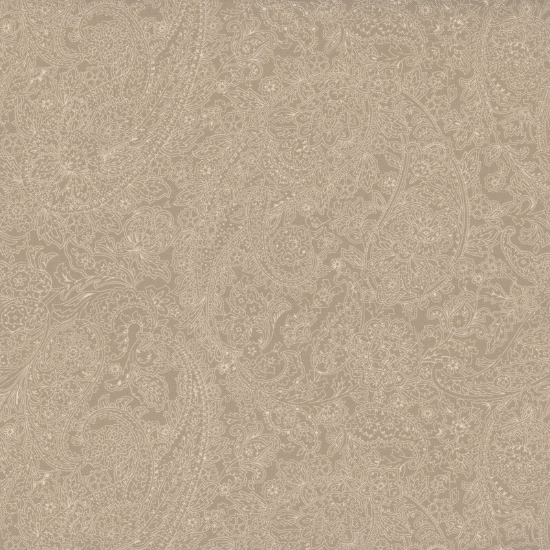 Tonal khaki tan fabric featuring a floral paisley design.
