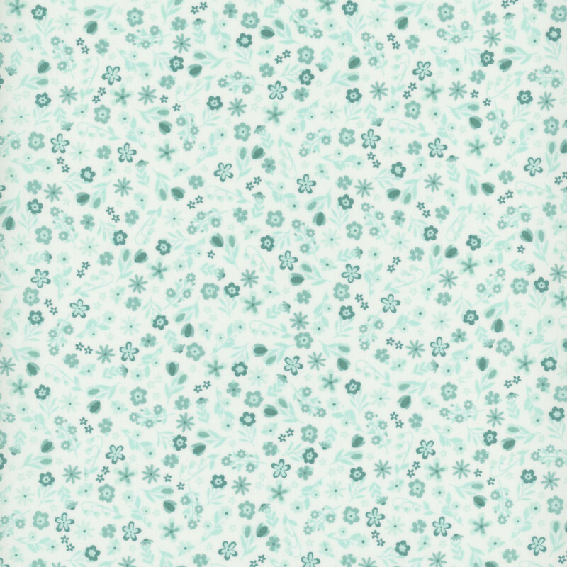 White fabric with a dense pattern of bright aqua calico flowers.