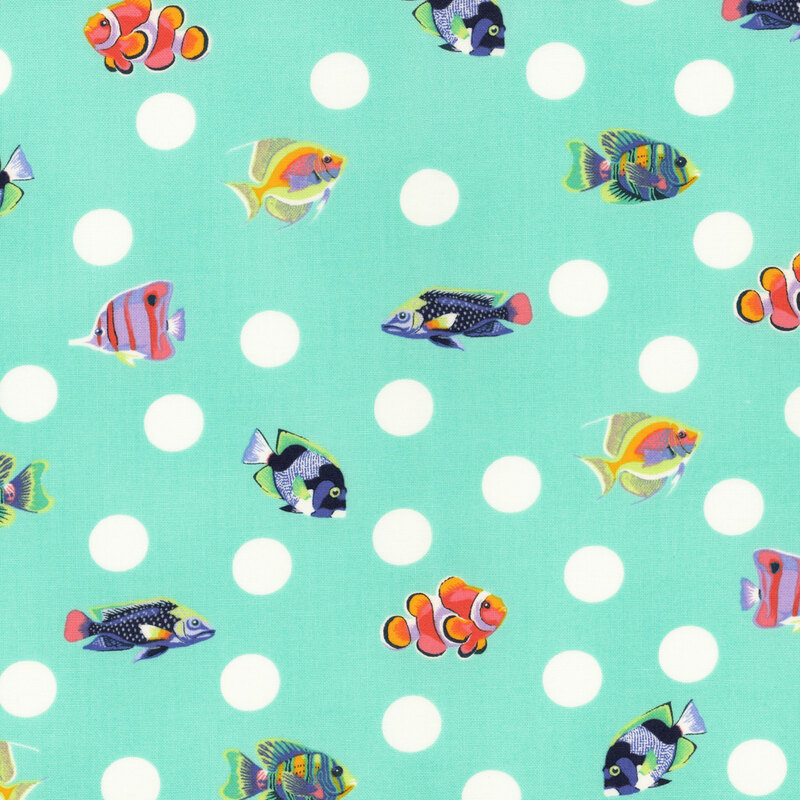 randomly spaced white polka dots and multicolored tropical fish on a seafoam greenbackground 