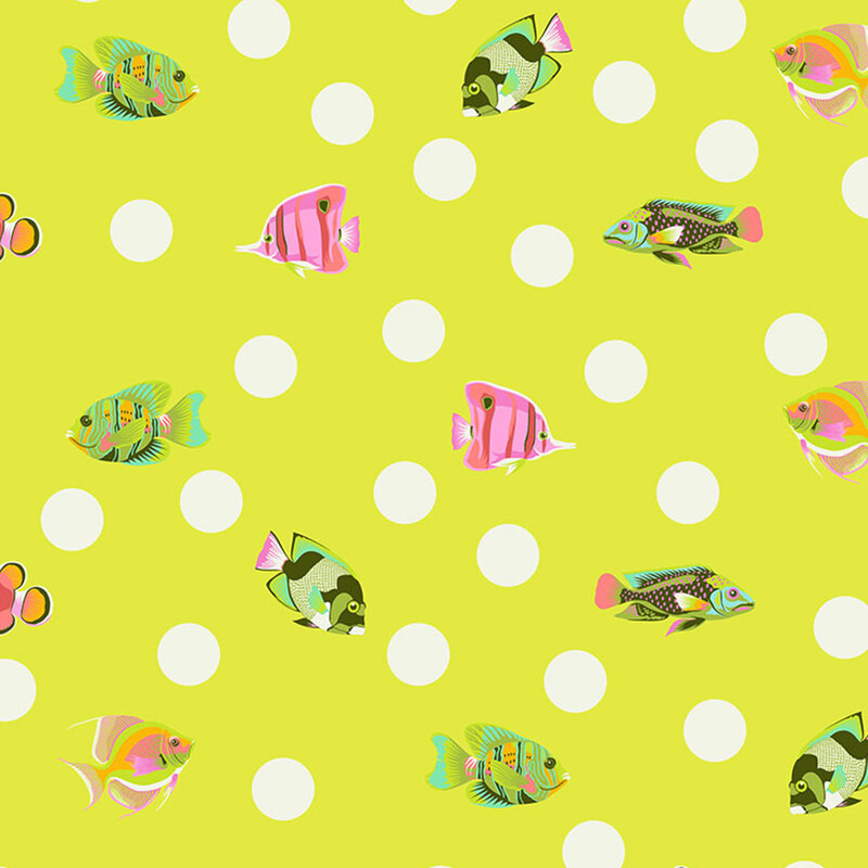 randomly spaced white polka dots and multicolored tropical fish on a neon yellow background 