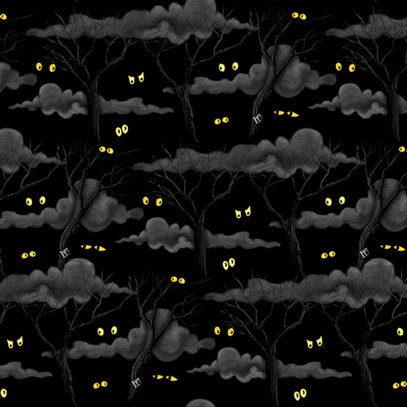 Jet black fabric featuring dark gray clouds, stark black trees, and tossed with yellow sets of eyes.