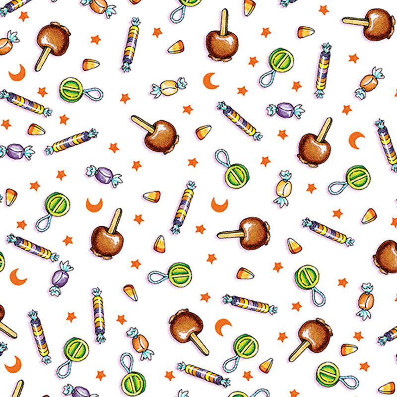 White fabric tossed with caramel apples, candy corns, candy suckers, stars, and moons.
