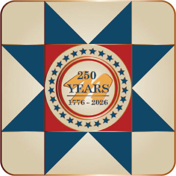 Commemorative pin with a red, white, and blue design with text celebrating 250 years of America, encircled by stars.