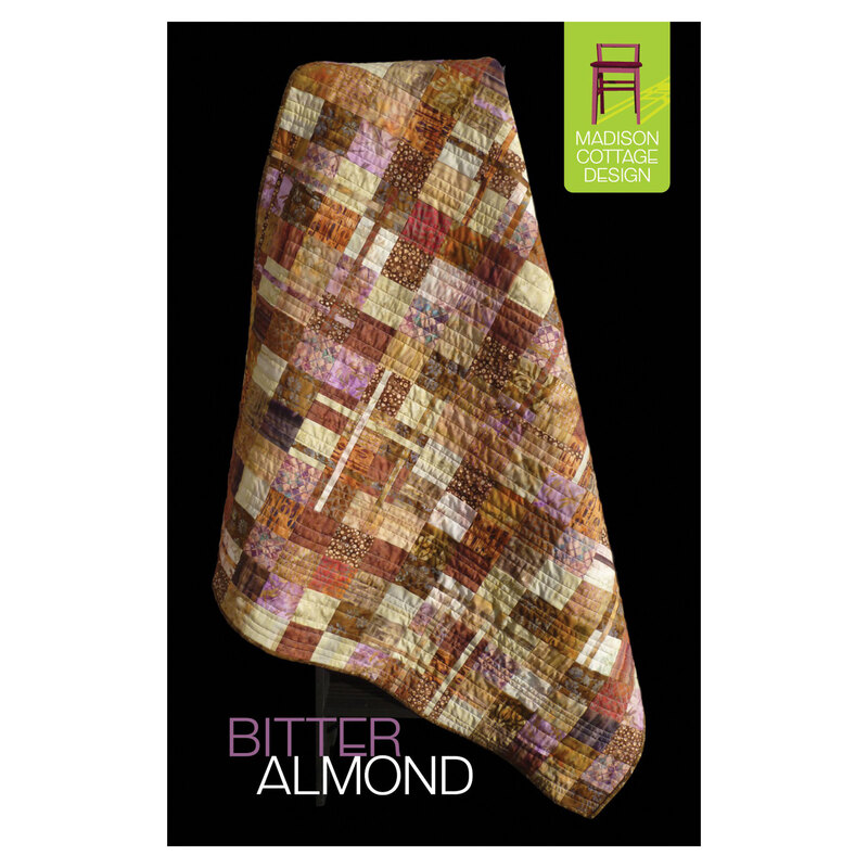 The front of the Bitter Almond Quilt Pattern featuring a geometric patchwork pattern