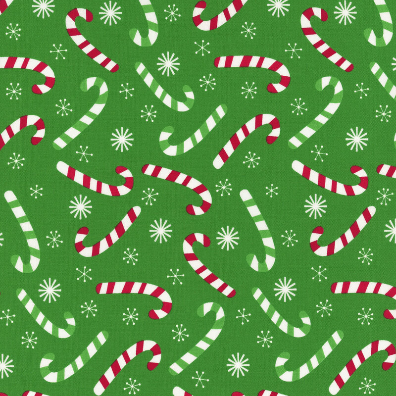 Kelly green fabric tossed with red and green striped candy canes and white snowflakes.