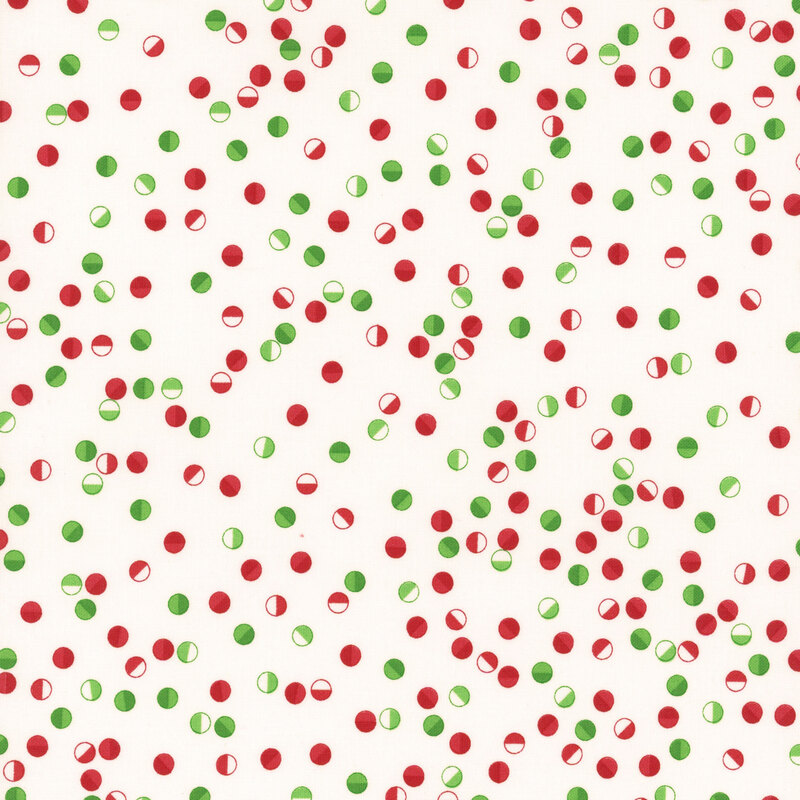 Festive circles in reds, greens, and white tossed on a winter white background.
