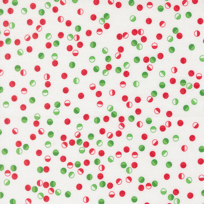 Festive circles in reds, greens, and white tossed on a winter white background.