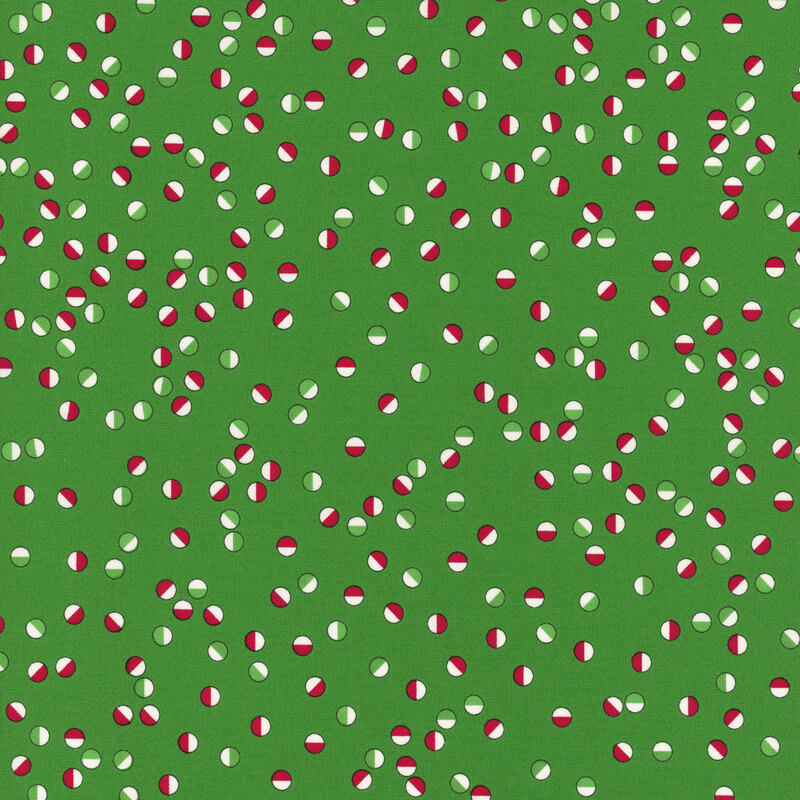 Festive circles in reds, greens, and white tossed on a kelly green background.