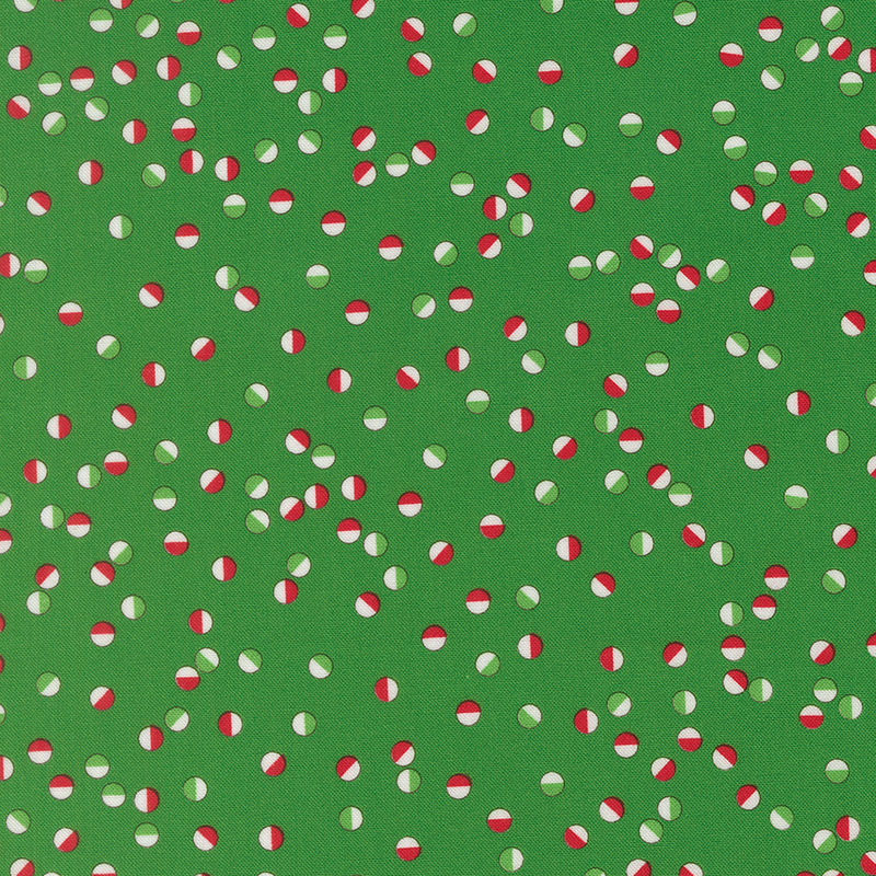 Festive circles in reds, greens, and white tossed on a kelly green background.