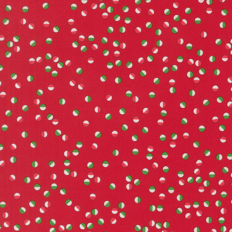 Festive circles in reds, greens, and white tossed on a cherry red background.