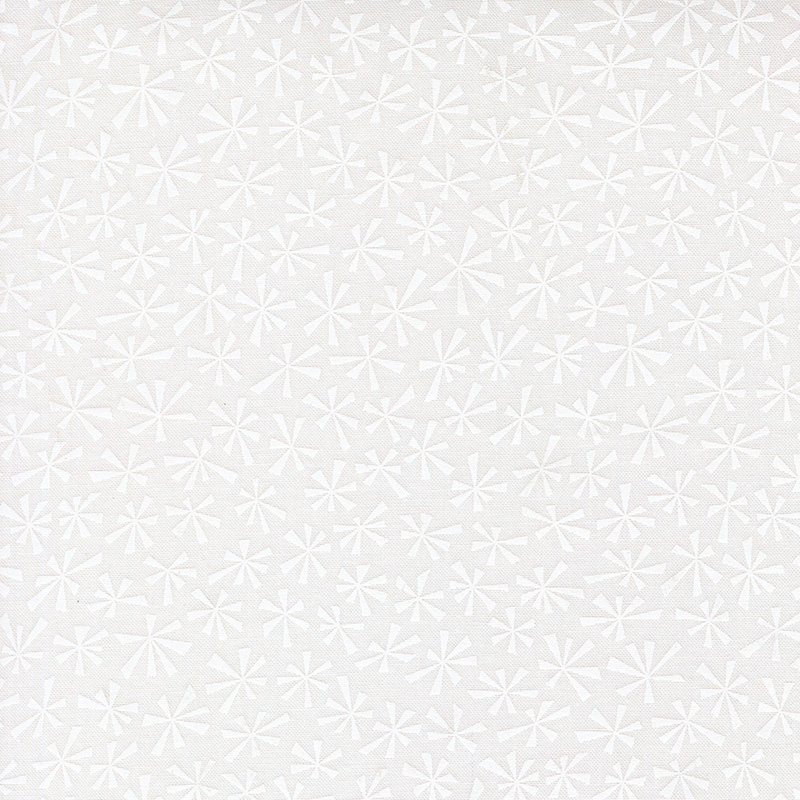 White on white fabric featuring stylized tonal snowflakes.