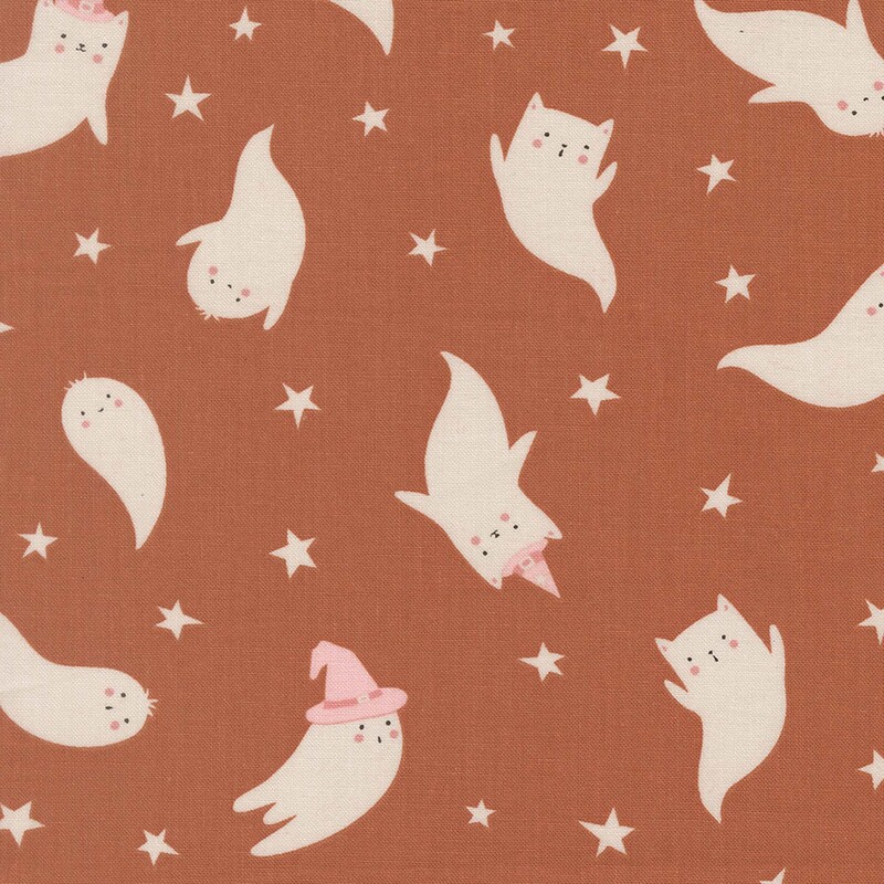Orange fabric with tossed white stars and cute cat ghosts.