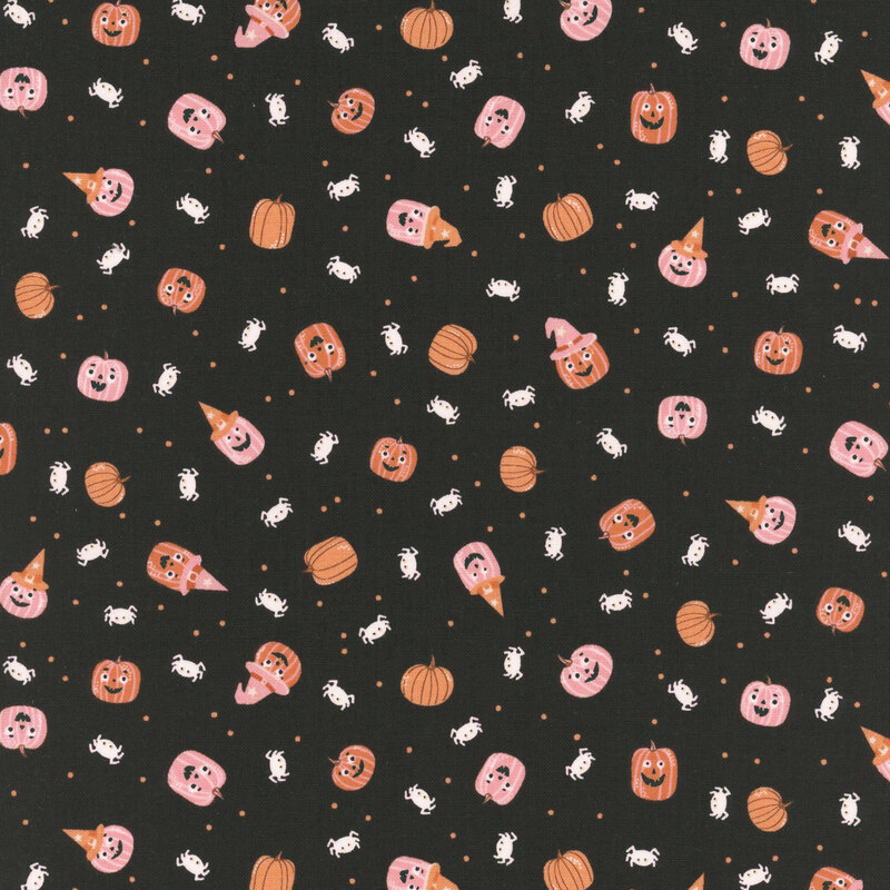 Black fabric with tossed pinprick dots, pumpkins, and spiders.