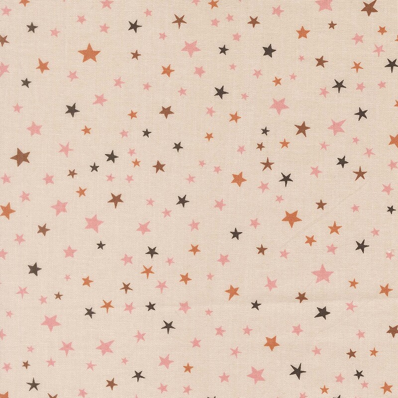 Off-white fabric with scattered, multicolor stars.