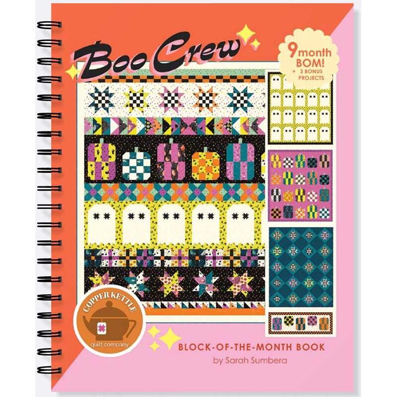 The front of the Boo Crew BOM pattern showcasing the finished quilt on a mockup front of a pattern book.