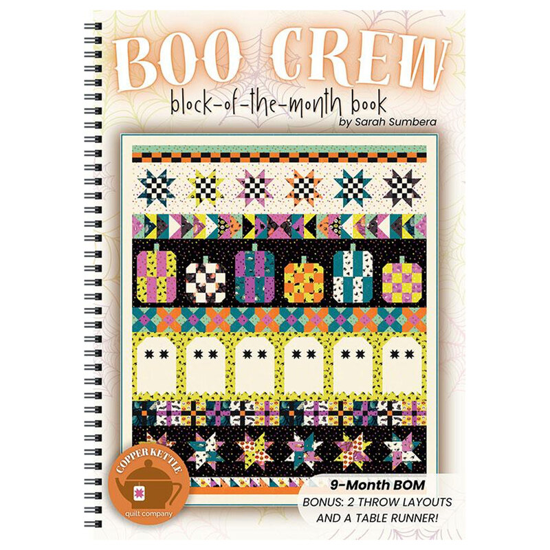 The front of the Boo Crew BOM pattern showcasing the finished quilt on a mockup front of a pattern book.