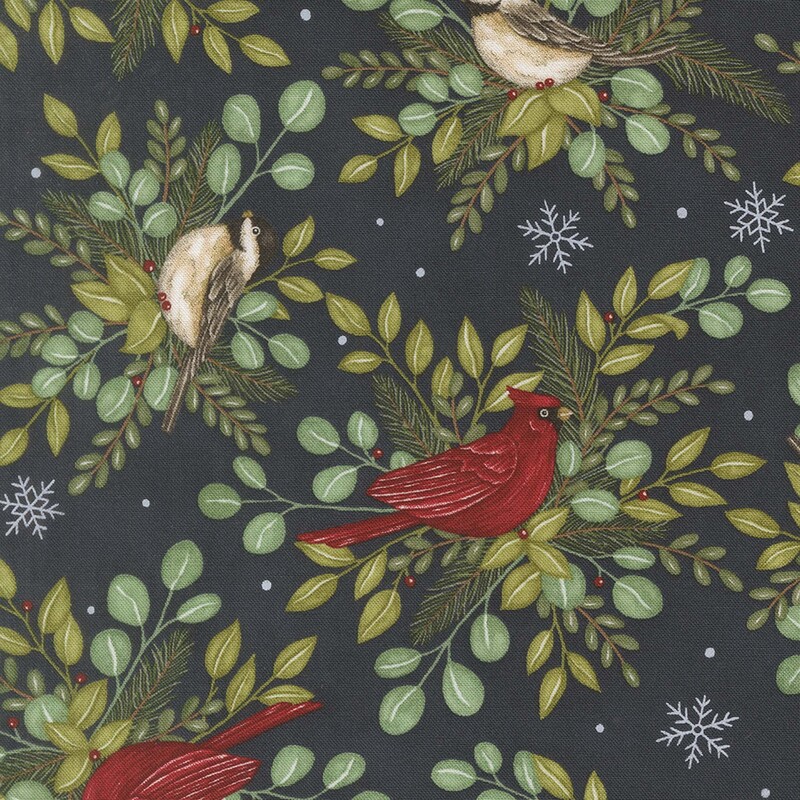 Finches and cardinals perched on bundles of green leaves on a midnight blue background