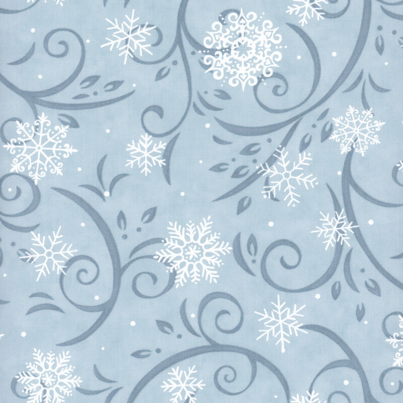Sky blue fabric with denim blue flourishes and white snowflakes