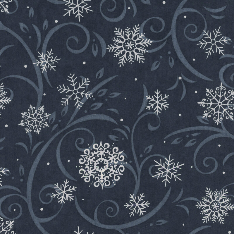 Midnight blue fabric with light indigo flourishes and white snowflakes