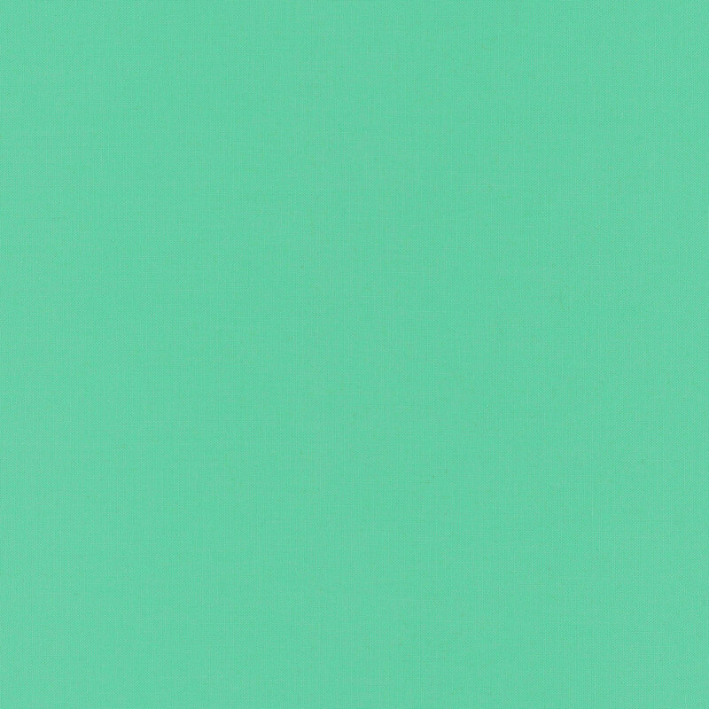 Solid fabric in a deep jade green color.