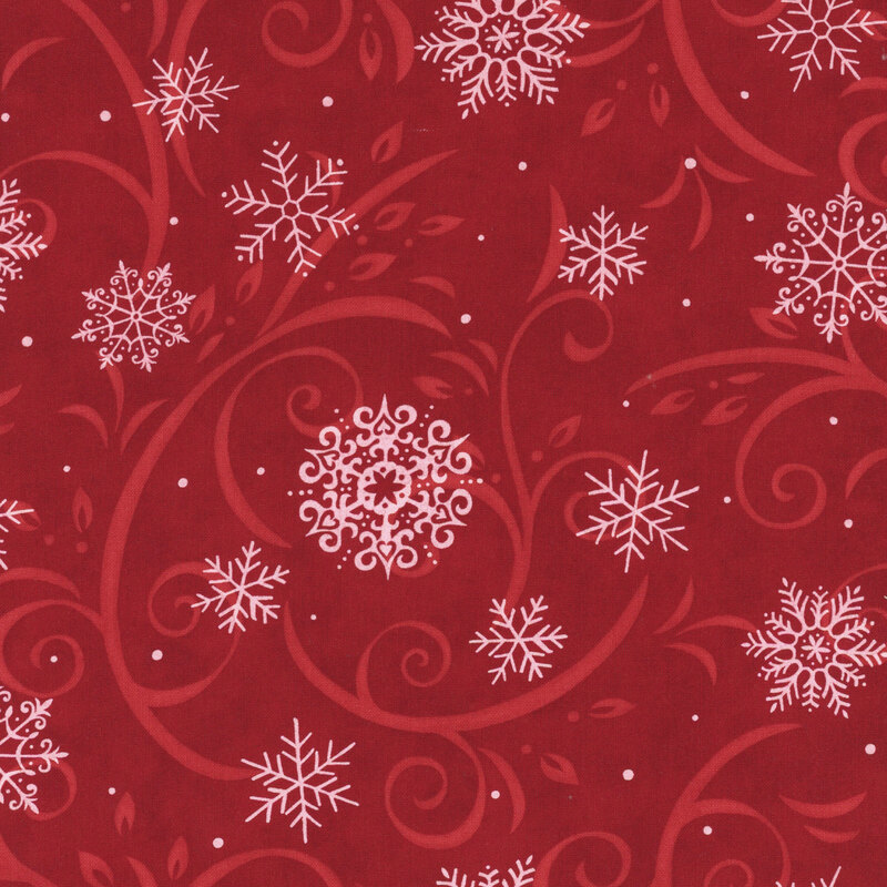 Cardinal red fabric with scarlet flourishes and white snowflakes