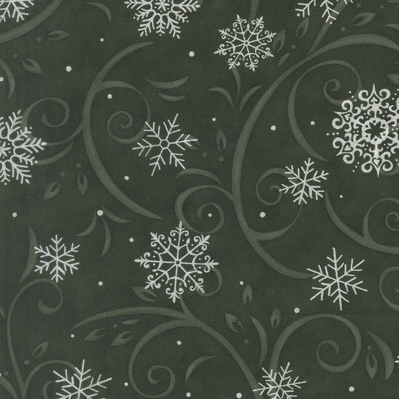 Spruce fabric with muted green flourishes and white snowflakes