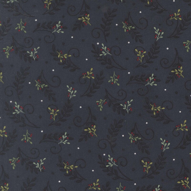 Midnight blue fabric with a tossed pattern of dark indigo leaves and swirls with green holly sprigs and red berries