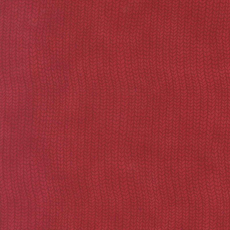 Mottled crimson red wavy knit stitches