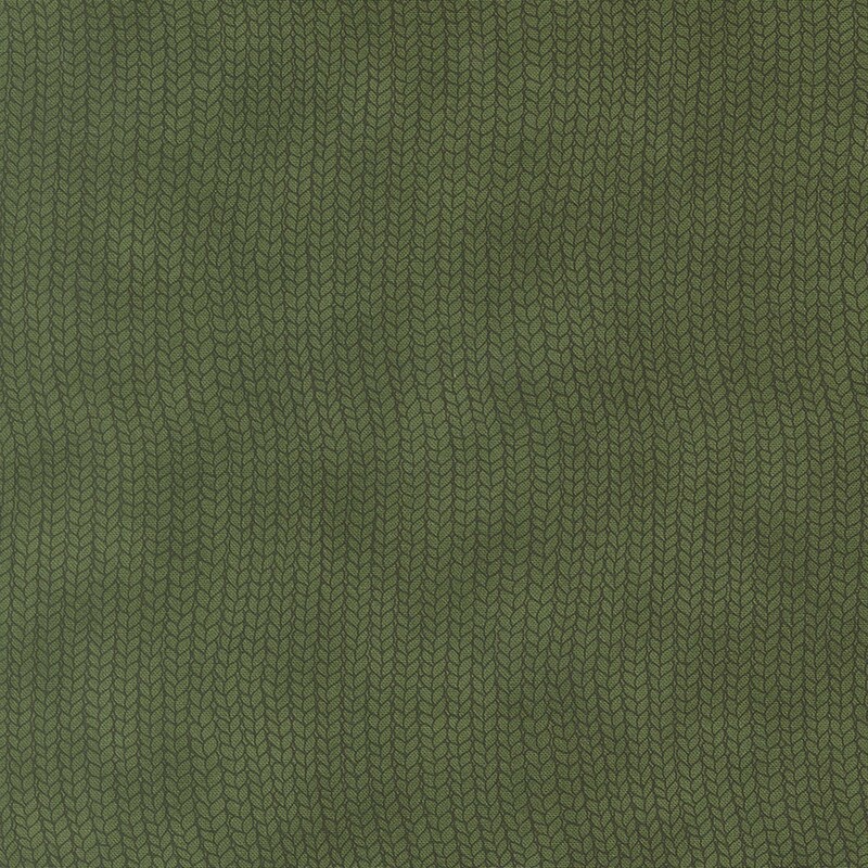 Mottled moss green fabric with a pattern of wavy knit stitches
