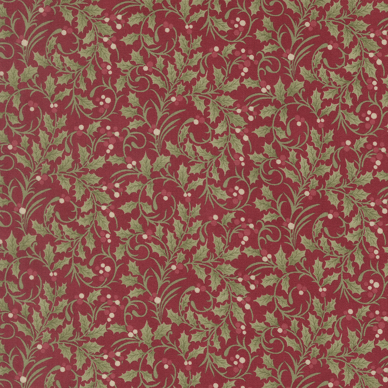 Red fabric with a dense pattern of swirling holly vines adorned with red and white drupes.