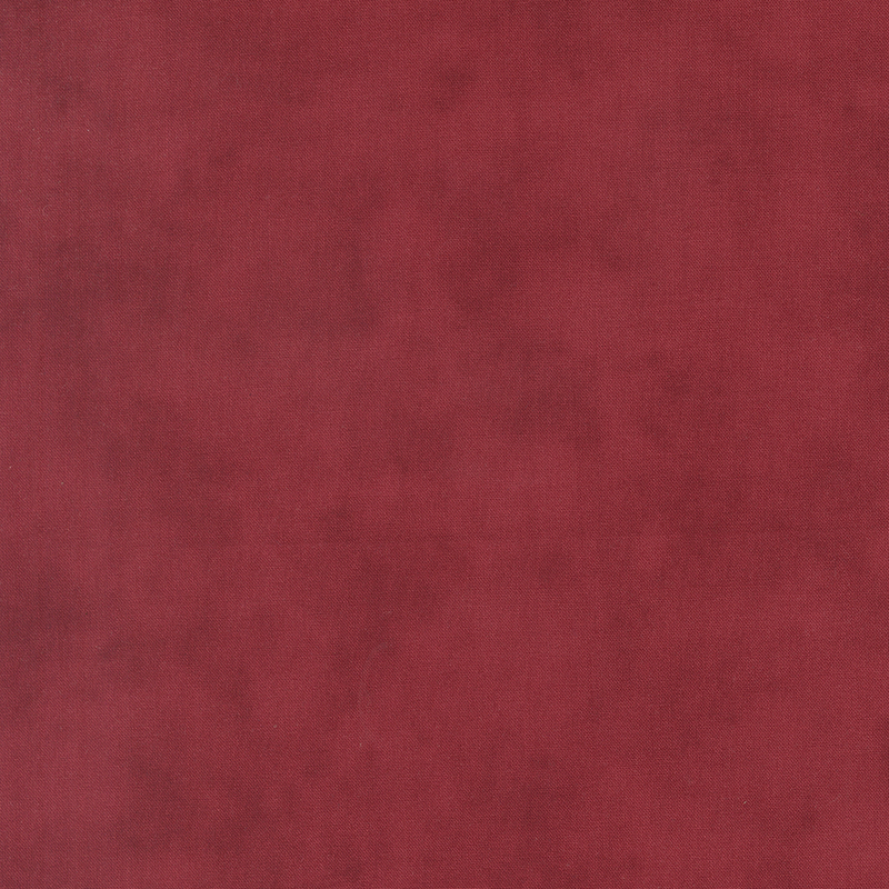 Basic mottled red fabric.