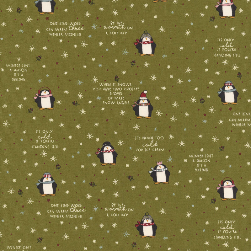 Green fabric with a whimsical pattern of cartoon penguins, snowflakes, stars, holly, and winter-themed phrases.