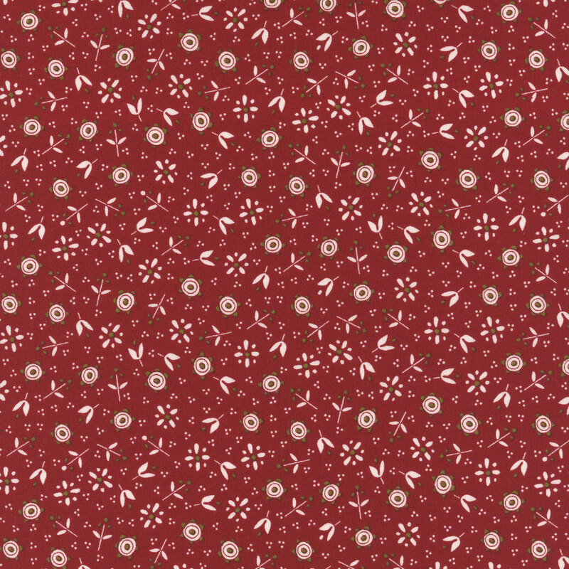 Red fabric adorned with a pattern of small calico florals and pin dots.