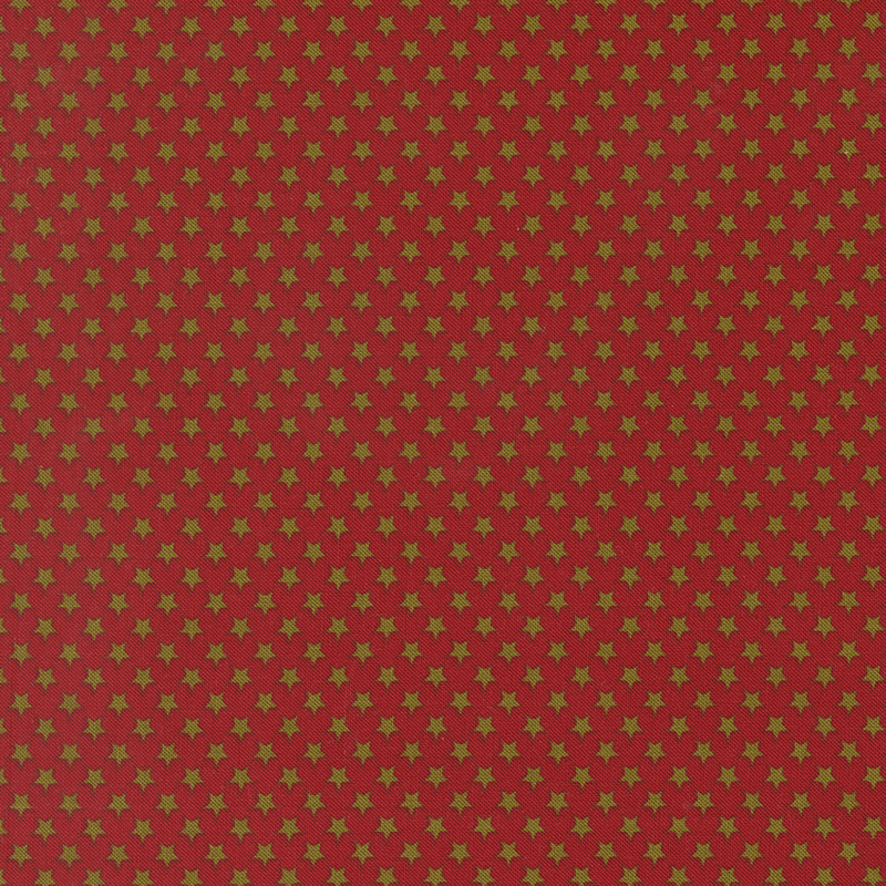 Red fabric with small, densely arranged green stars.
