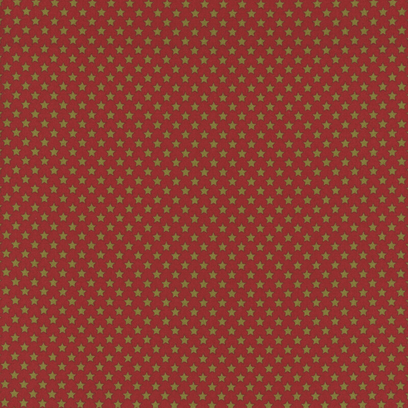 Red fabric with small, densely arranged green stars.