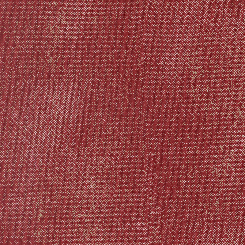 Red fabric with a textured, grunge-inspired pattern.