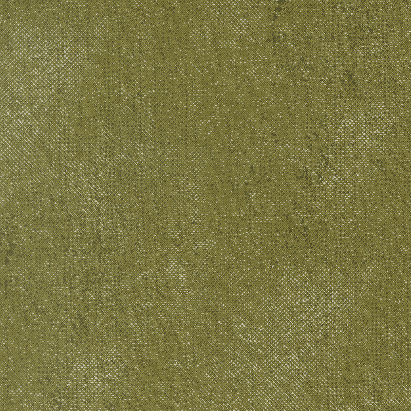 Sage green fabric is accented with a textured, grunge-inspired pattern.