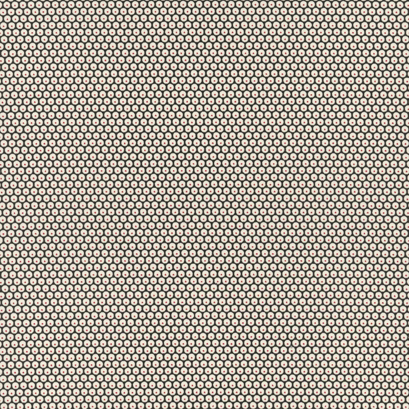 Black fabric with a dense pattern of white circles accented by red-centered dots.